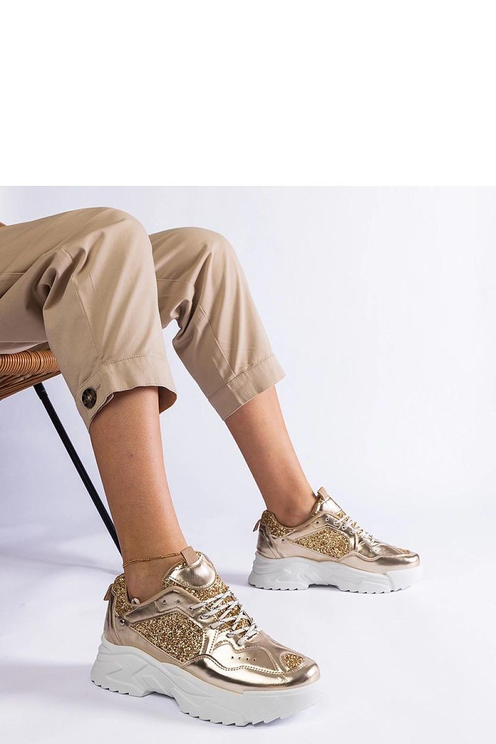 Luxurious Solea golden women's sneakers featuring elegant brocade inserts, made from high-quality eco-leather for comfort. Perfect for stylish everyday wear.