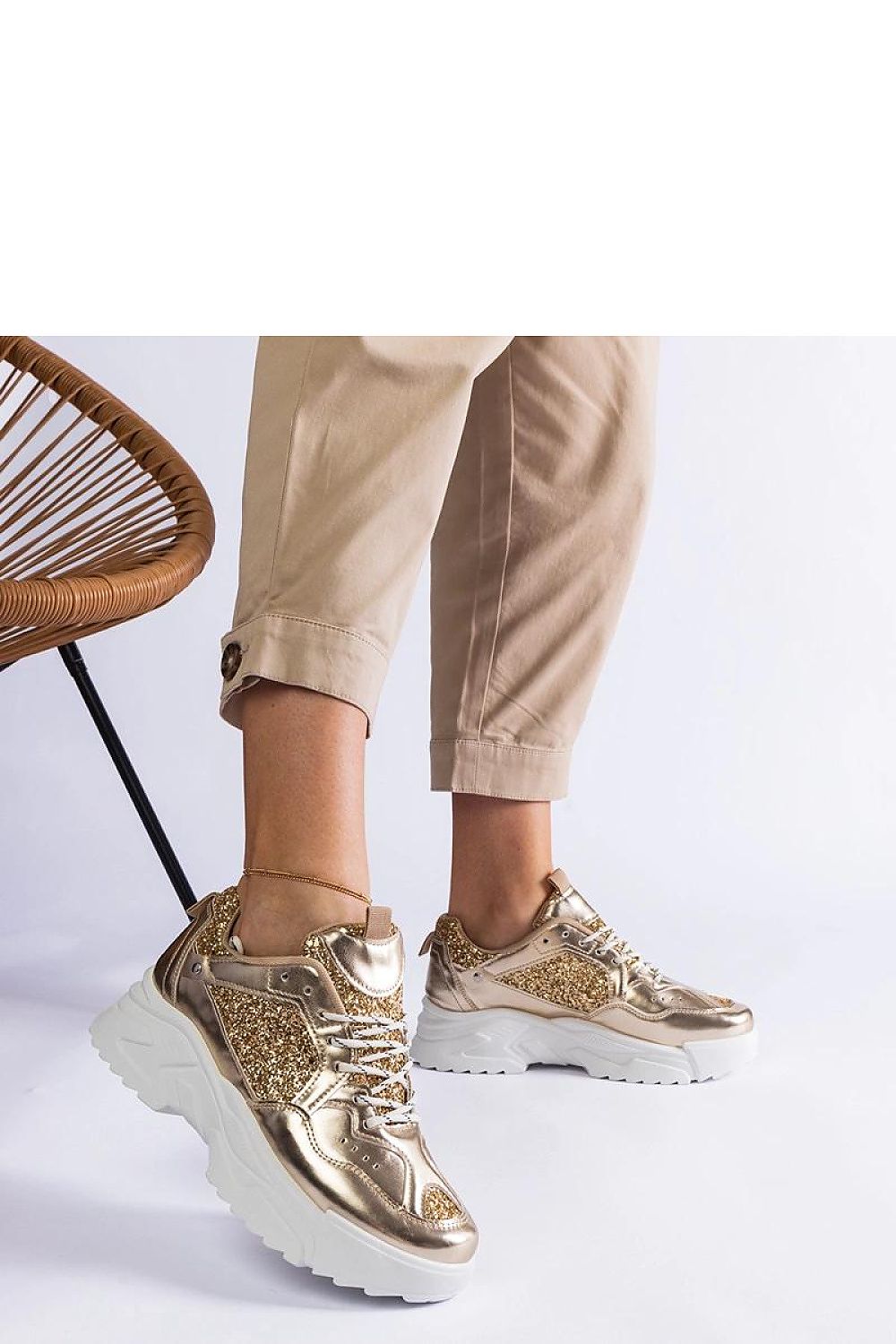 Solea luxury golden women's sneakers showcasing exquisite brocade inserts, crafted from eco-leather for ultimate comfort and style.
