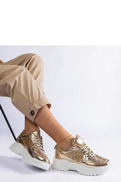 Solea eco-leather women's sneakers in captivating golden tone with sophisticated brocade detailing and lace-up closure for a personalised fit.