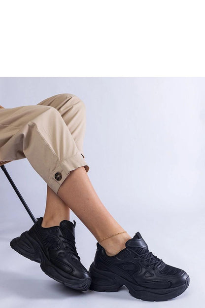 Solea white sneakers with chic chunky soles, embodying sophistication and practicality for the fashion-forward individual.