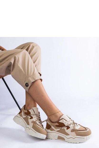 Solea luxury brown sneakers displayed with a modern rubber sole, ideal for comfort and grip, available in sizes EU 36-41.