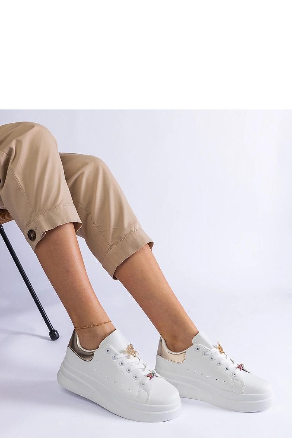 Elegant Solea women's white platform sneakers showcasing a unique butterfly design, made of durable eco-leather, ideal for warm weather fashion.