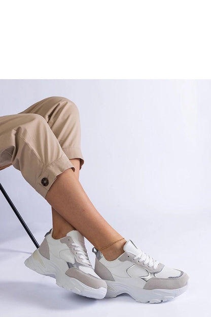 Solea white sneakers featuring Torreza Hurtado sole, showcasing elegant streetwear style and comfort, ideal for everyday casual wear.