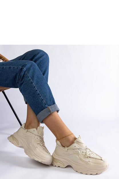 Elegant Solea beige women's sports sneakers Urena Hurtado showcasing a chic lace-up design, perfect for active lifestyles.