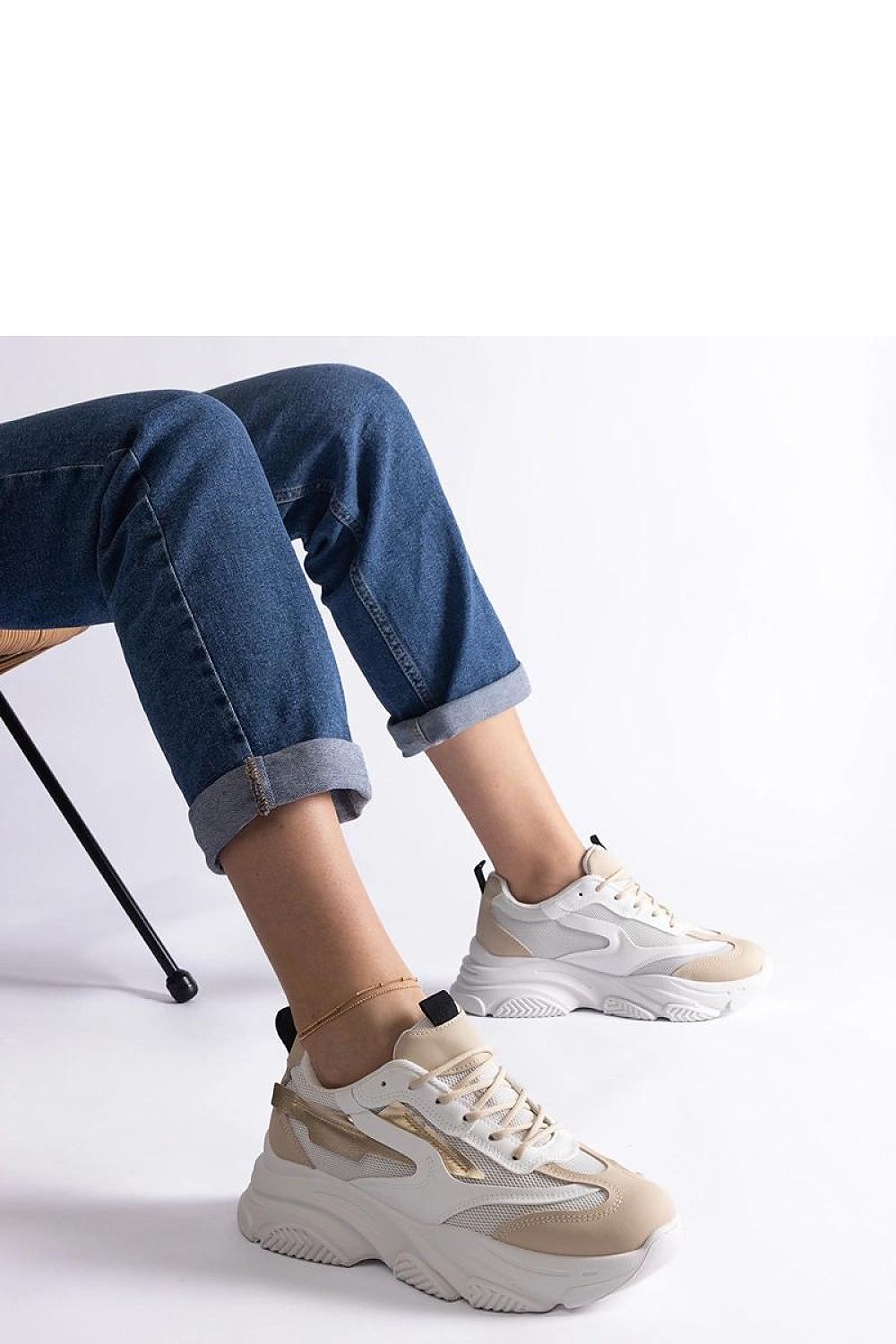 Side profile of Milenka Hurtado burgundy-gray sneakers, epitomizing luxury and style, available in EU sizes 36-41.