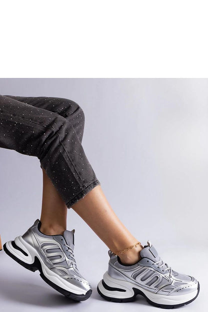 Close-up of Solea women's sporty sneakers in silver, highlighting the lace-up closure and high-quality material for optimal fit.