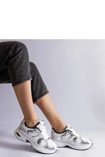 Close-up of Solea Ena Hurtado White Sports Sneakers, showcasing their premium lace-up features and soft rubber sole for durability.