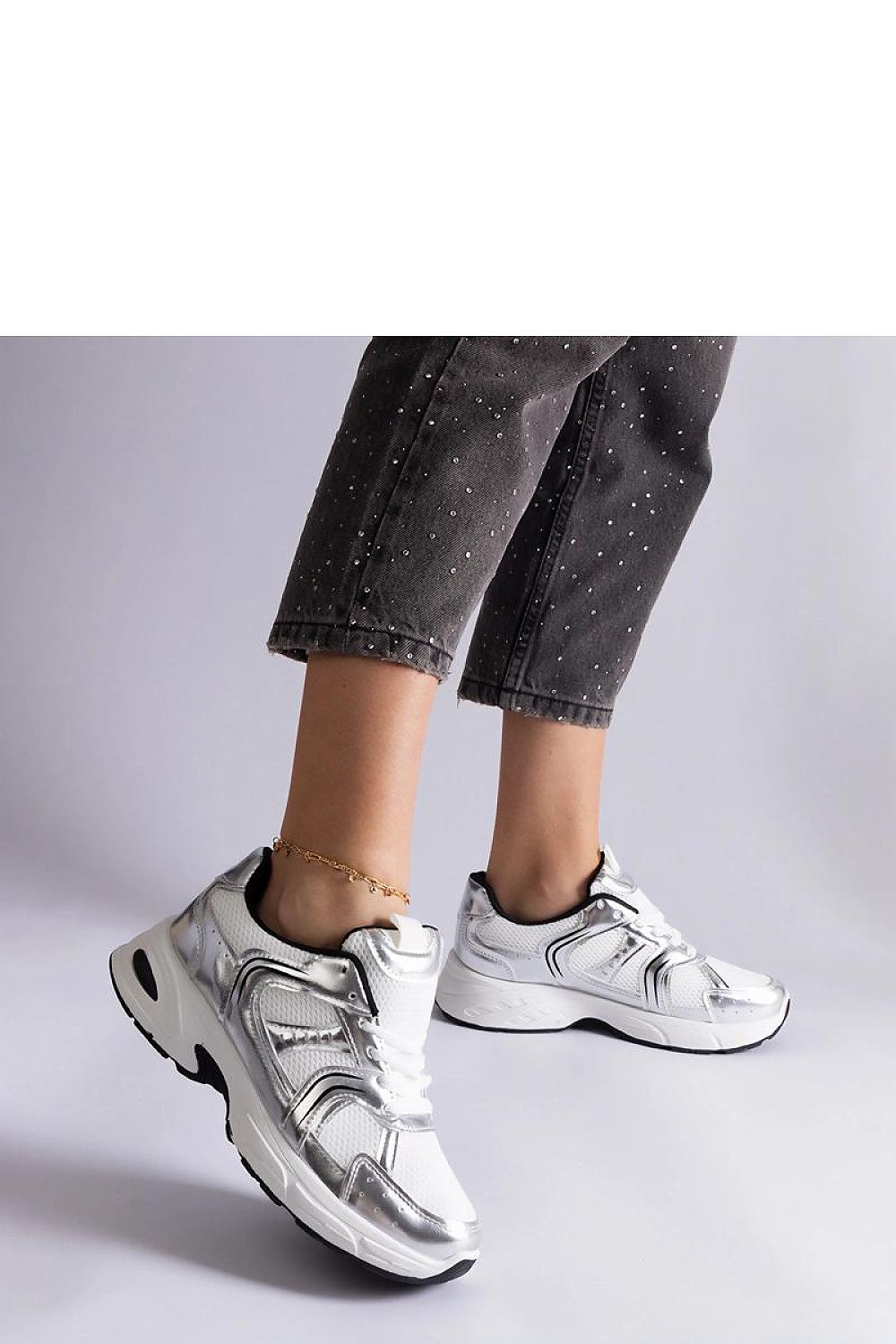 Solea Ena Hurtado white sports sneakers displayed from the side, highlighting their sleek silhouette and premium materials for ultimate comfort.