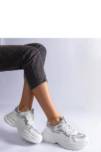 Solea designer sneakers in black, with brocade accents, perfect for both casual outings and formal occasions.