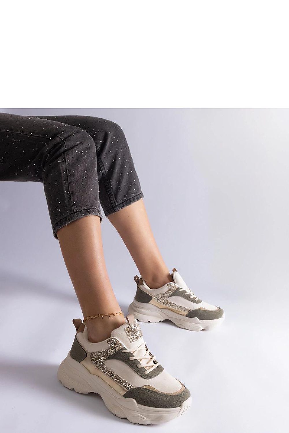 Close-up of Solea Beige Lace-Up Sneakers featuring intricate brocade detailing on eco-suede leather, a luxurious choice for everyday wear.