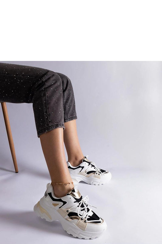 Solea Black and White Sports Sneakers elegantly displayed, showcasing high-quality synthetic leather, designed for comfort and durability in athletic footwear.