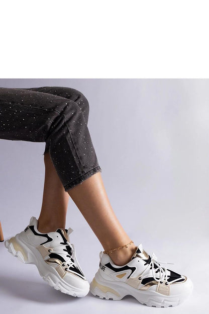 Solea Black and White Sports Sneakers on a display, highlighting the athletic style with a low profile silhouette and lace-up closure for a personalized fit.