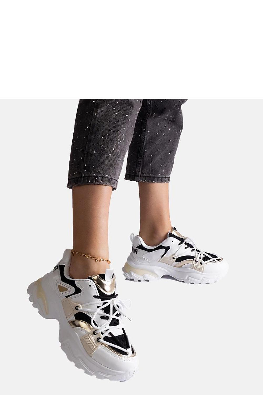 Solea Black and White Sports Sneakers displayed elegantly, showcasing their stylish design and sporty elegance.