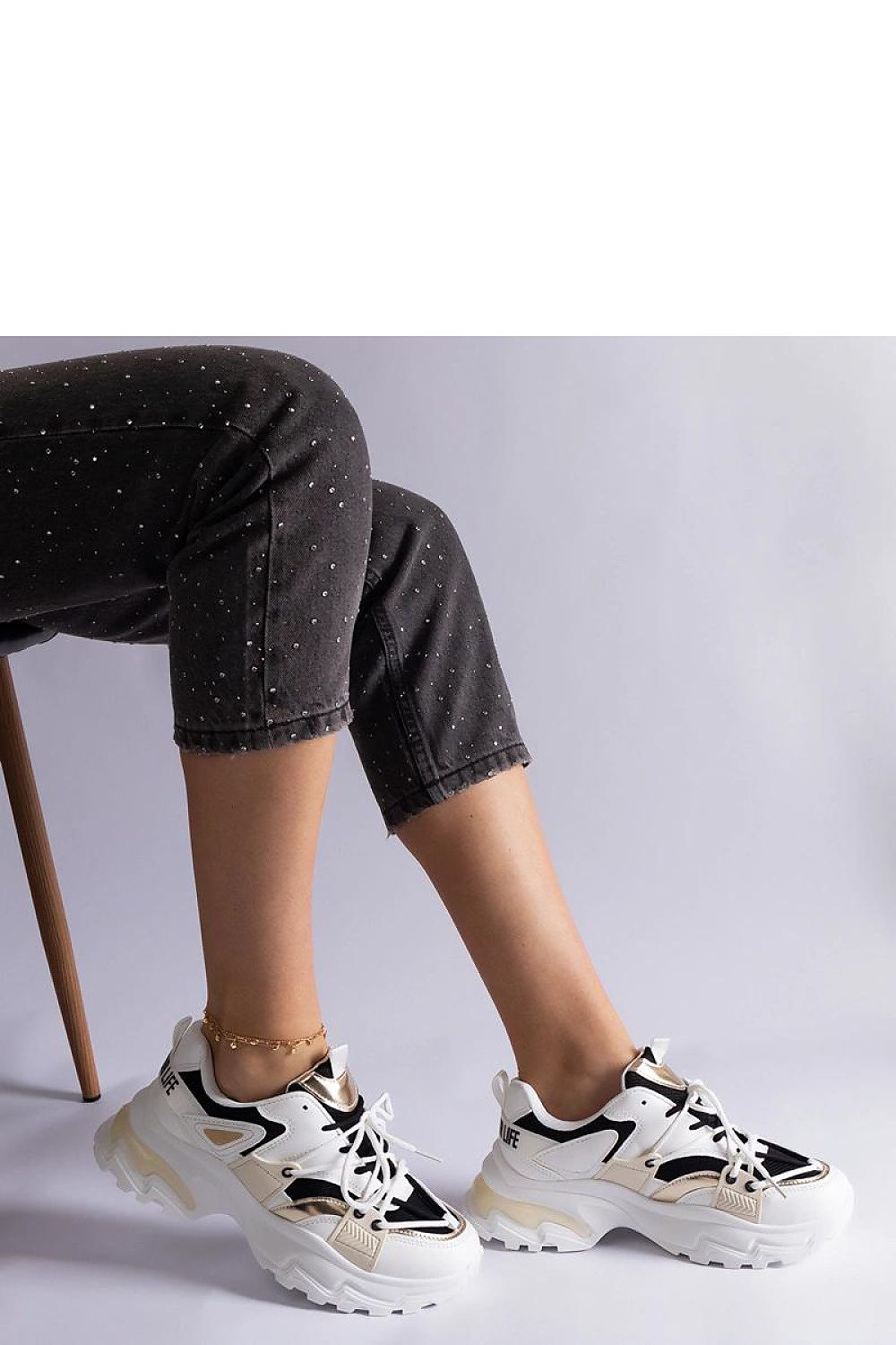 Close-up view of Solea Black and White Sports Sneakers, highlighting the high-quality synthetic leather and lace-up closure.