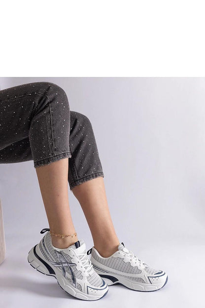 Solea Ondina Hurtado women's black sports sneakers set against a stylish backdrop, illustrating their trendy appeal for everyday active wear.