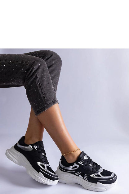 Chic Solea women's black sneakers with glossy silver details, ideal combination of luxury and practicality for versatile outfits.