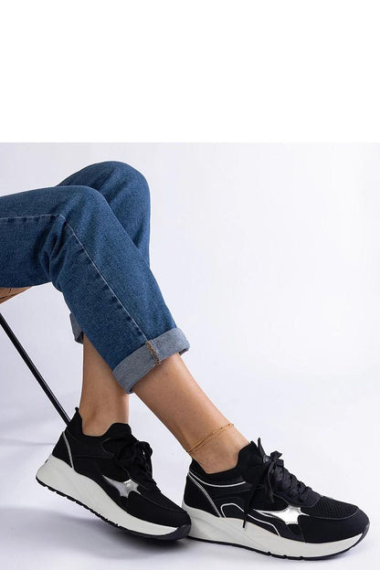 Solea Women's Black Sports Sneakers Elsira Hurtado, featuring a stylish and functional design with adjustable fit, ideal for workouts and everyday wear. Elegant low upper and black rubber sole complementing active lifestyles, available in EU sizes 36-41.