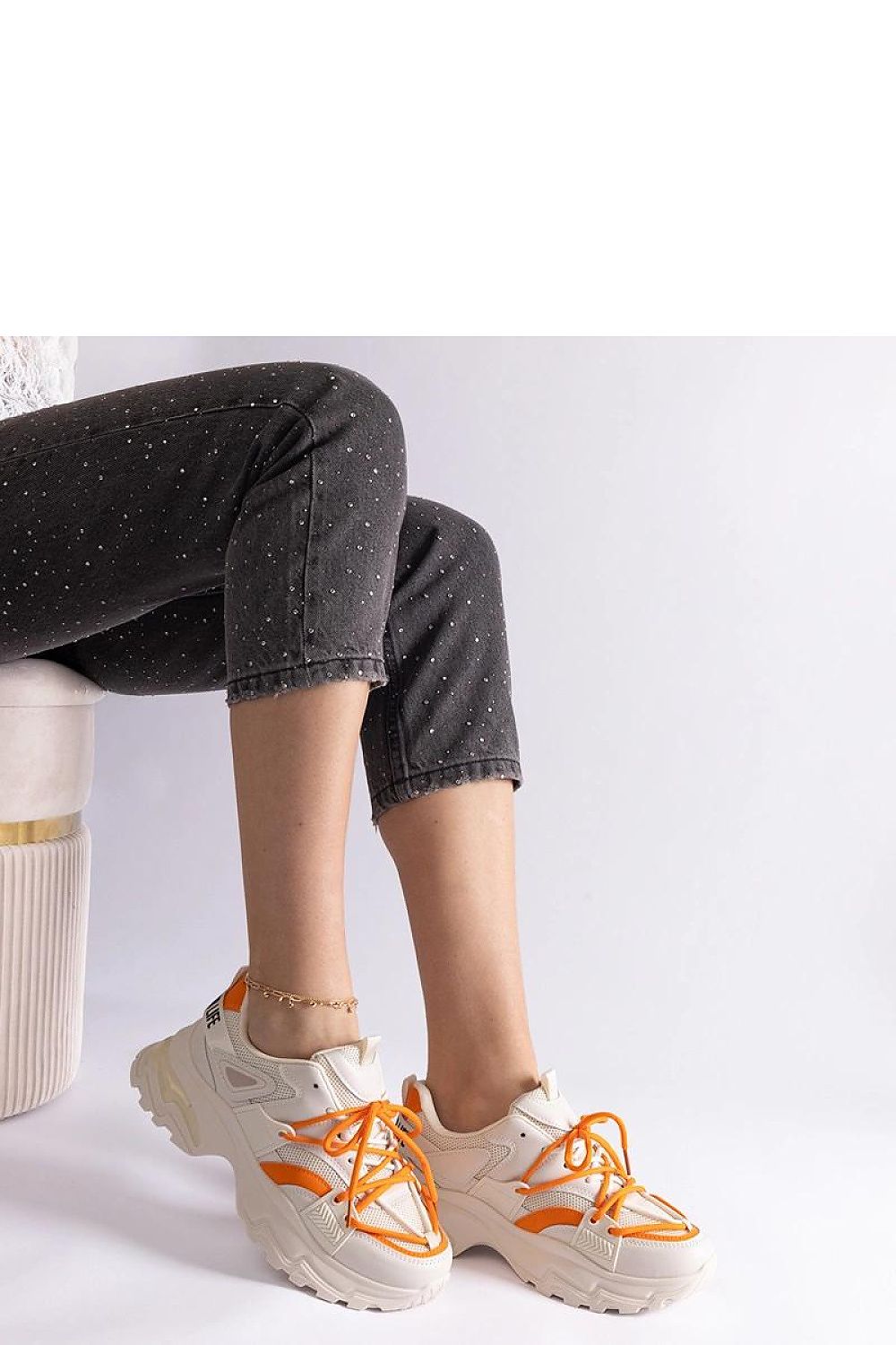 Side profile of Solea Black and White Sports Sneakers, emphasising their modern low profile and sporty appeal.