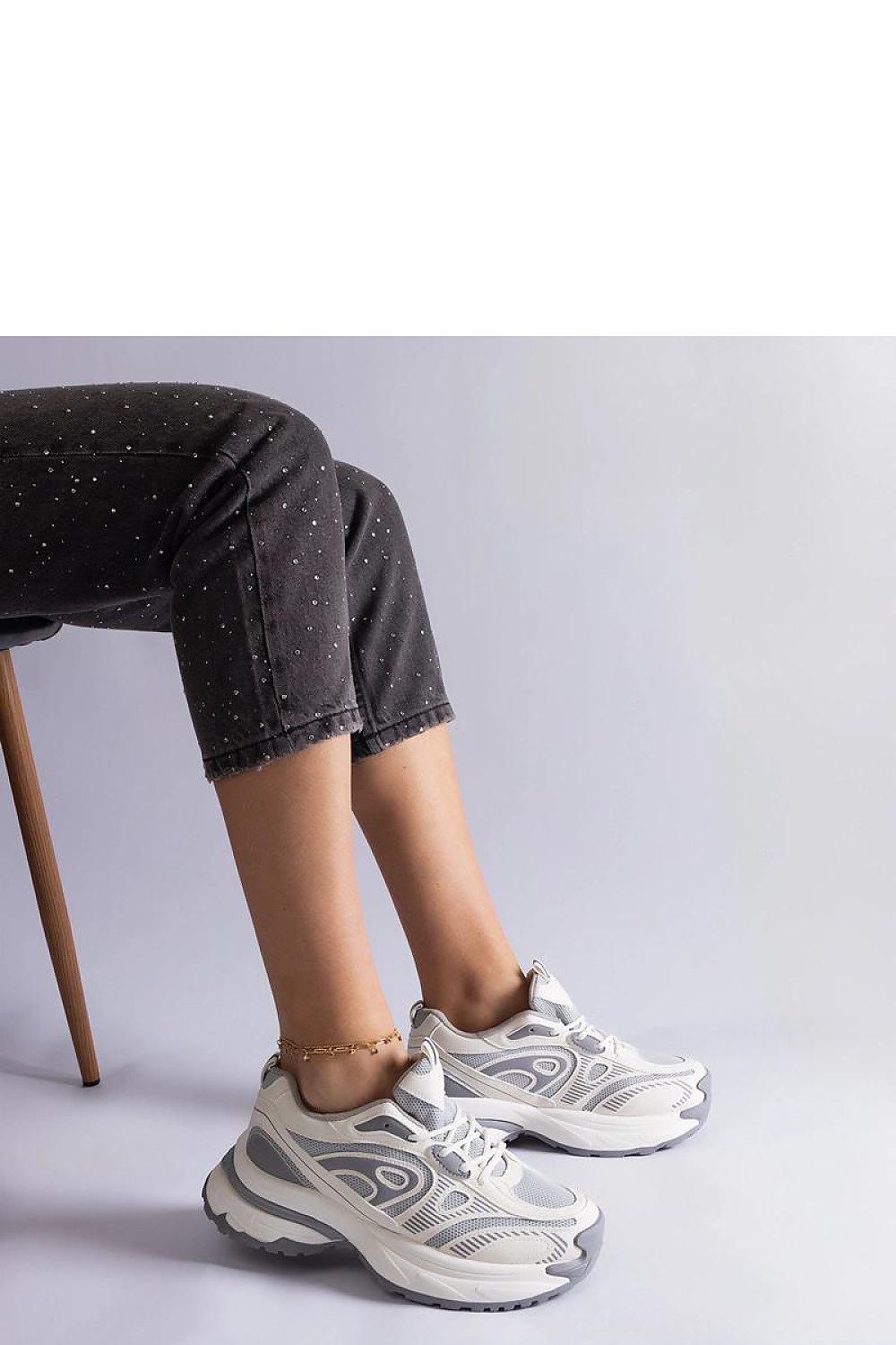 Solea Women's Gray Sports Sneakers showcasing a stylish lace-up design, crafted from elegant synthetic leather for a luxurious feel and comfortable fit.