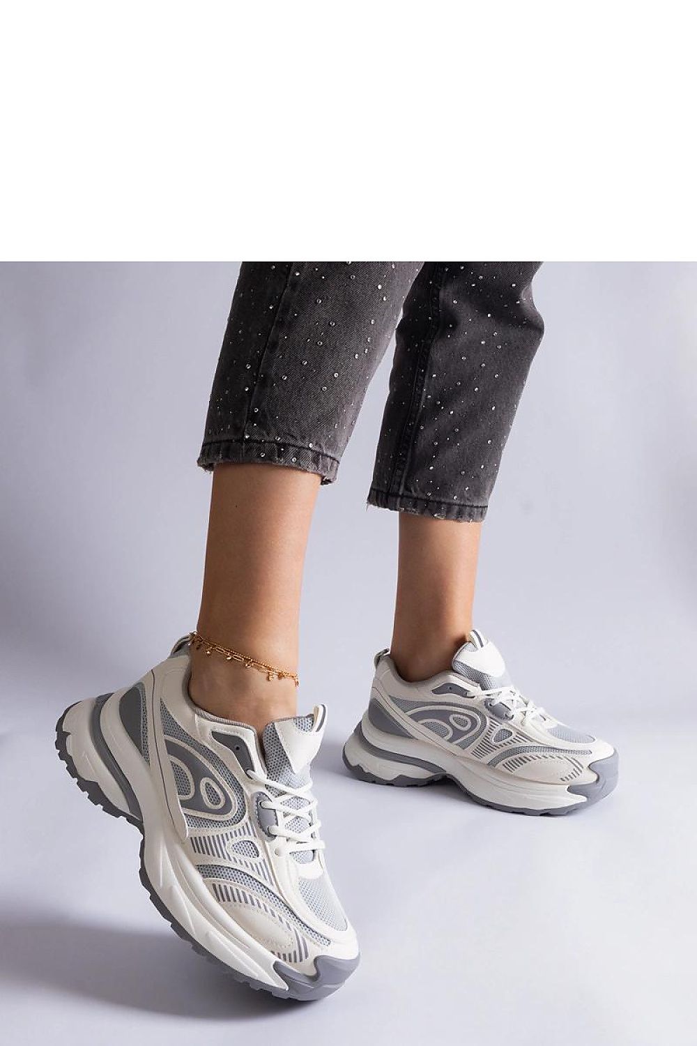 Close-up image of Solea Women's Gray Sports Sneakers featuring premium synthetic leather, designed for durability and superior comfort.