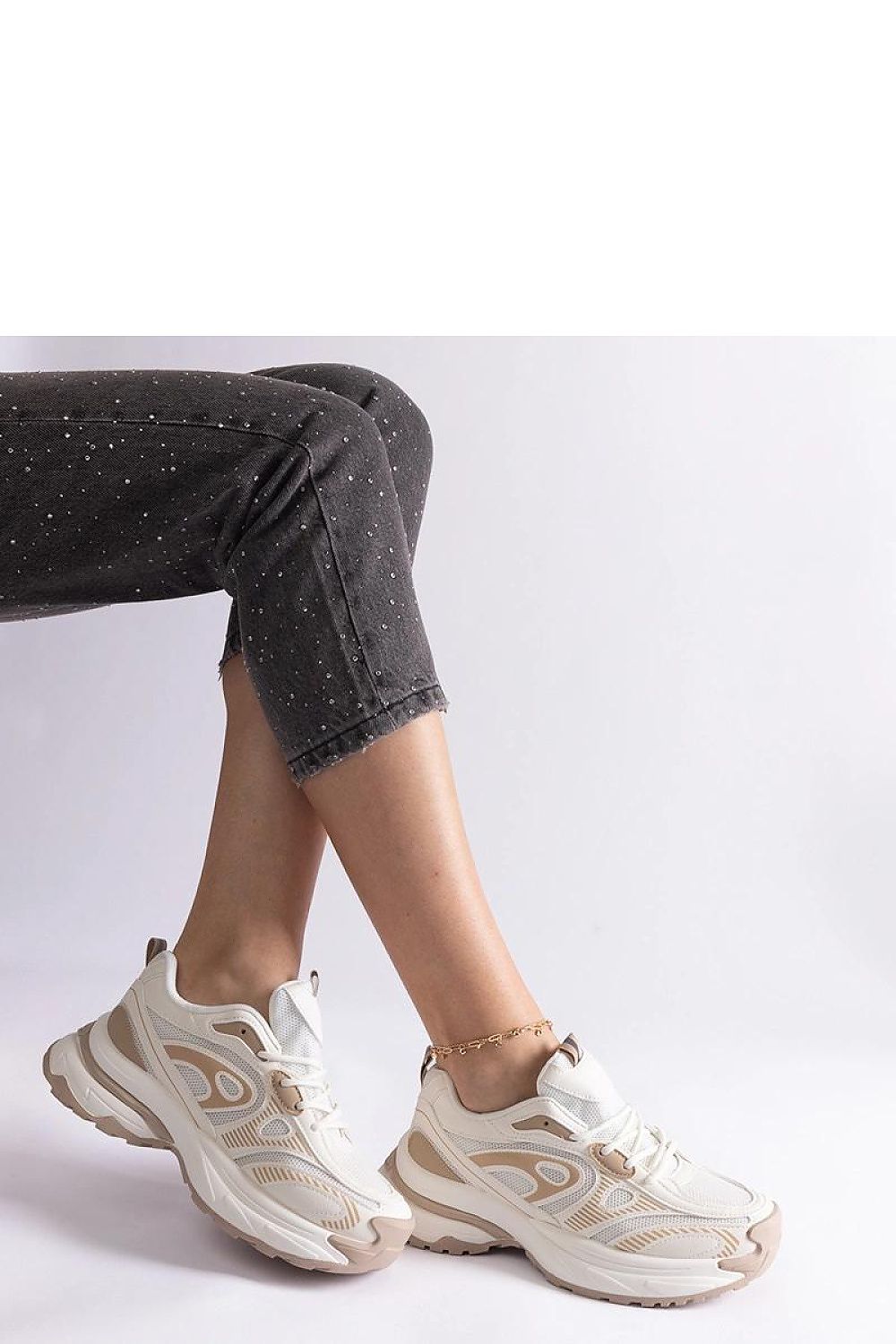 Side view of Solea Women's Gray Sports Sneakers showcasing the chic gray colour and elegant silhouette, perfect for any sporty or casual outfit.