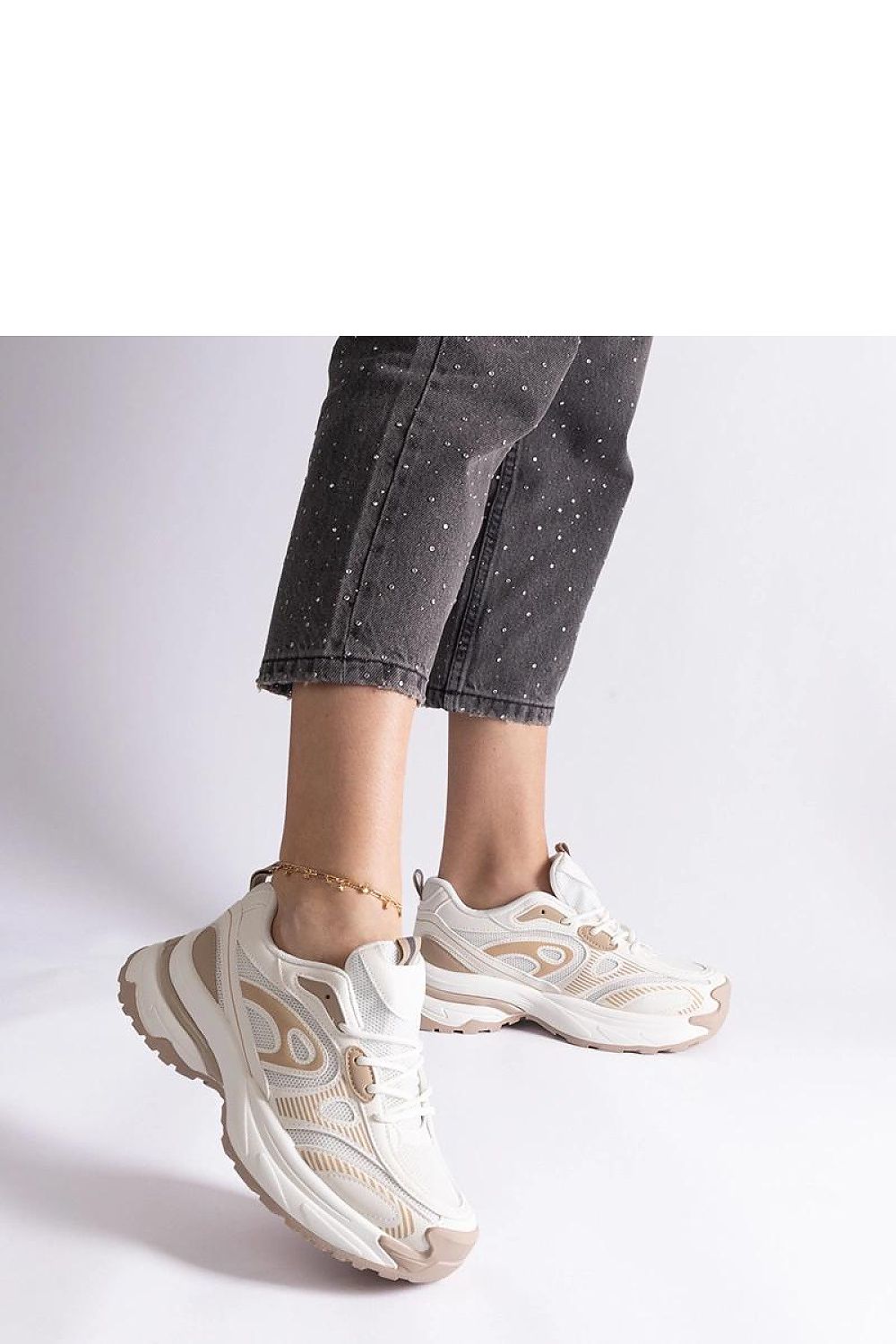 Solea Women's Gray Sports Sneakers shown in a lifestyle context, illustrating their versatility and luxurious appeal for everyday fashion.