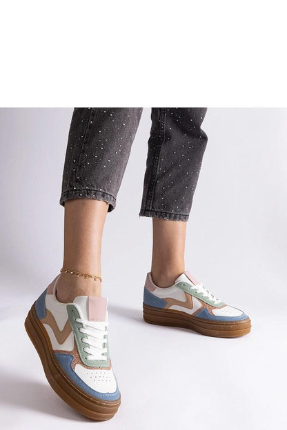 Stylish Solea sneakers in blue, designed for comfort with a chic low upper and robust brown rubber sole.