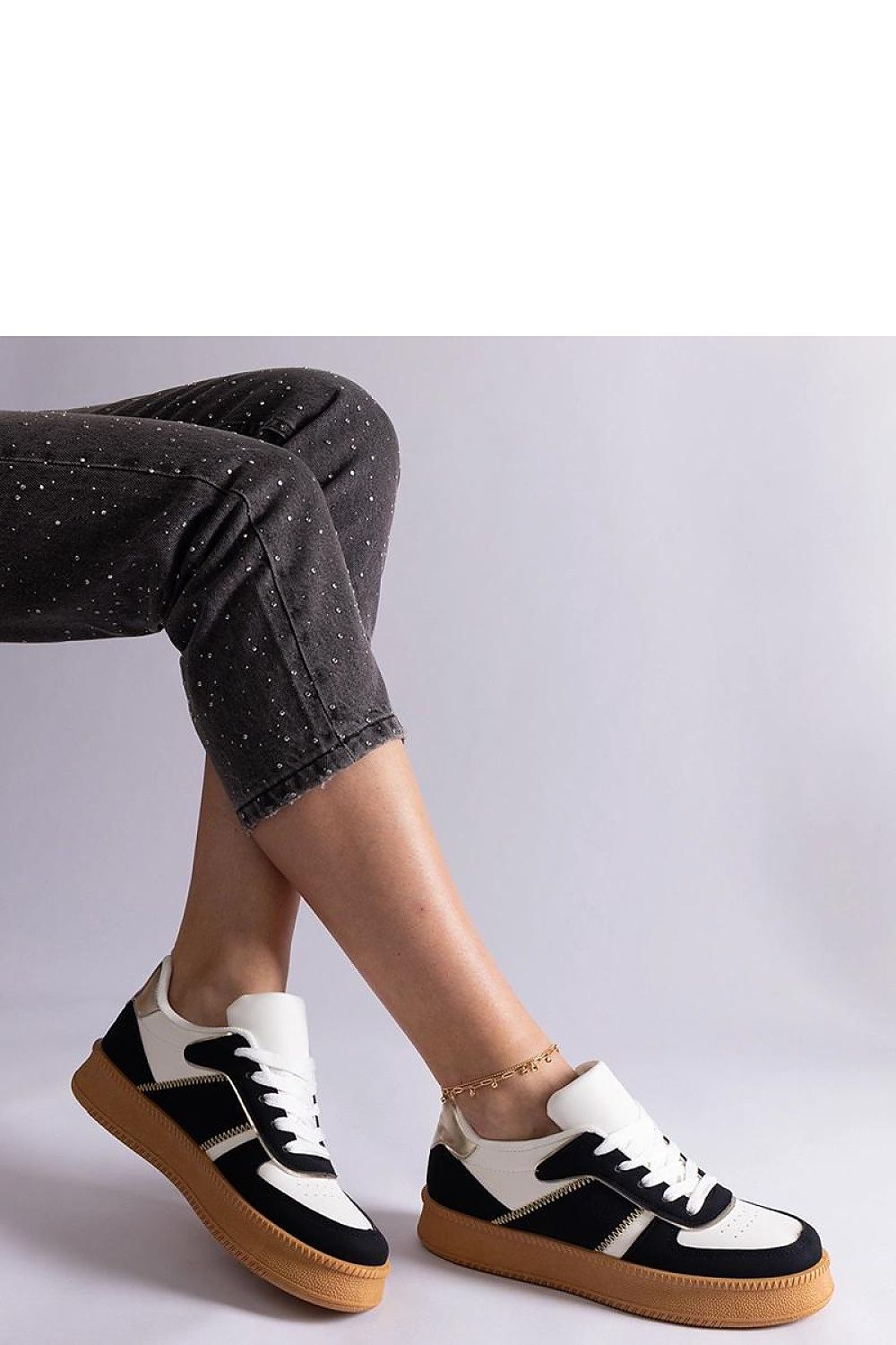 Solea black vegan leather platform sneakers showcasing elegant lace-up design and stylish comfort for modern women.