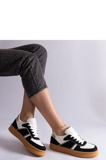 Solea black vegan leather platform sneakers showcasing elegant lace-up design and stylish comfort for modern women.