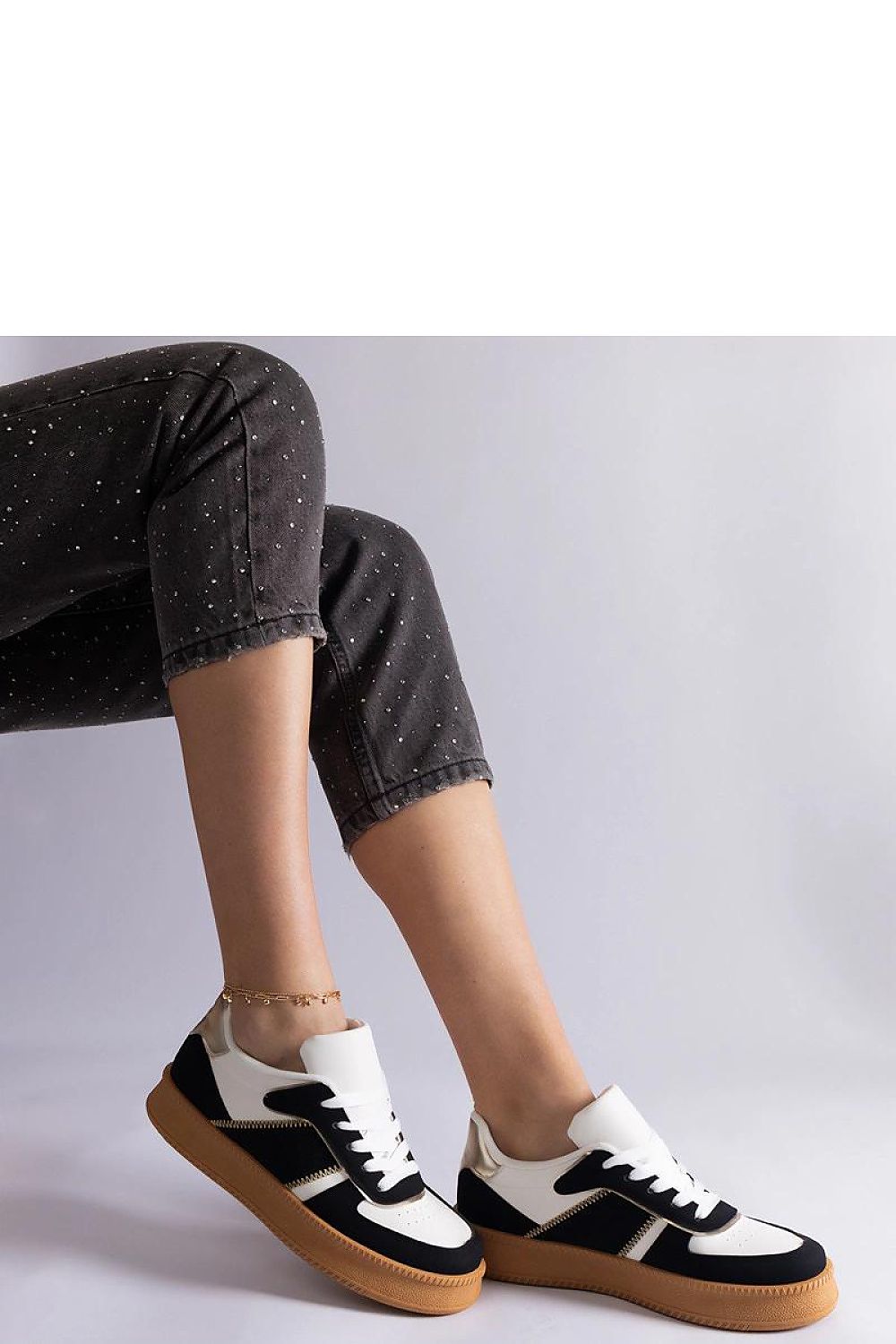 Solea Black Vegan Leather Platform Sneakers elegantly displayed, showcasing their designer lace-up style and high-quality material, ideal for fashion-forward women.