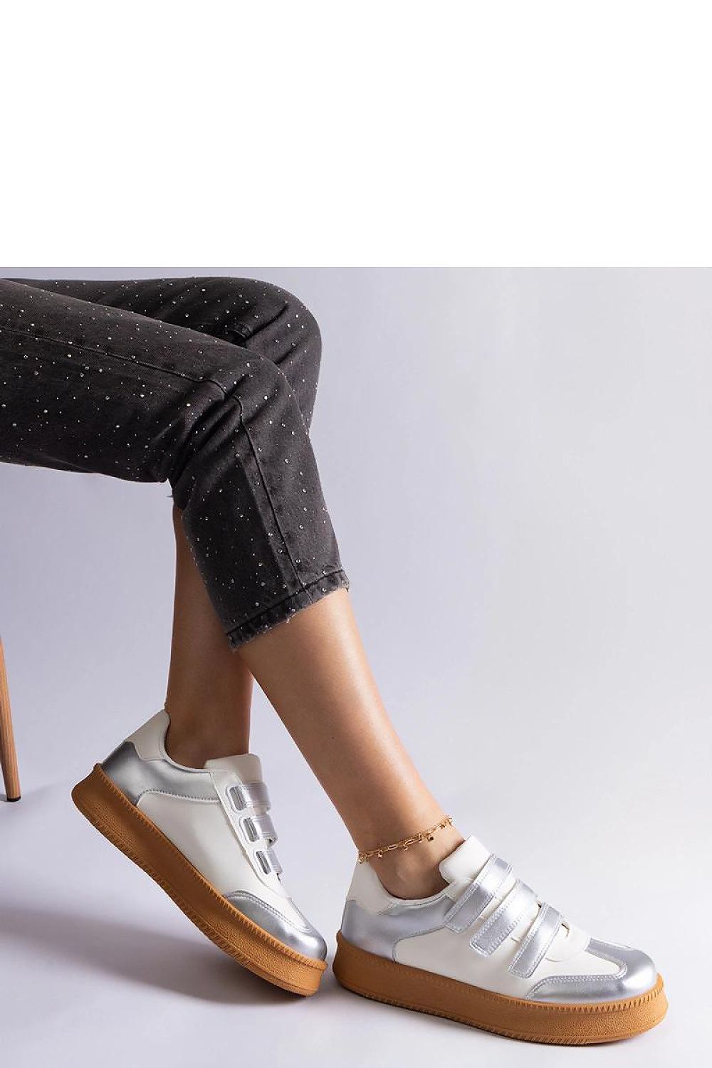 Elegant Solea golden sneakers featuring Velcro fastening and a chic, sustainable eco-leather finish.