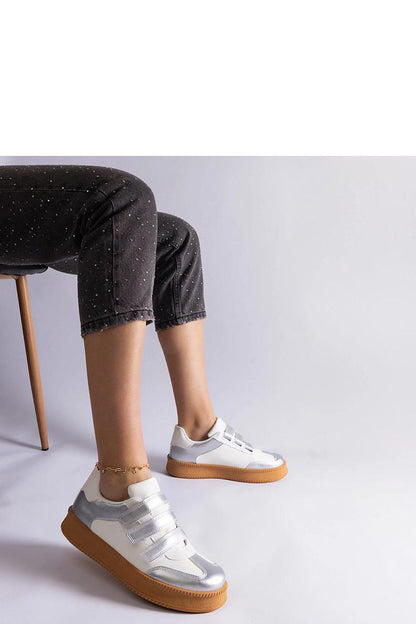 Solea comfortable golden sneakers with a brown rubber sole, perfect for both casual and elegant outfits.