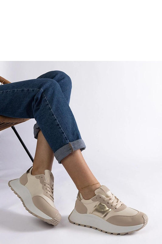 Elegant beige platform sneakers by Solea, featuring a low cut design and showcasing stylish comfort, perfect for contemporary casual wear.