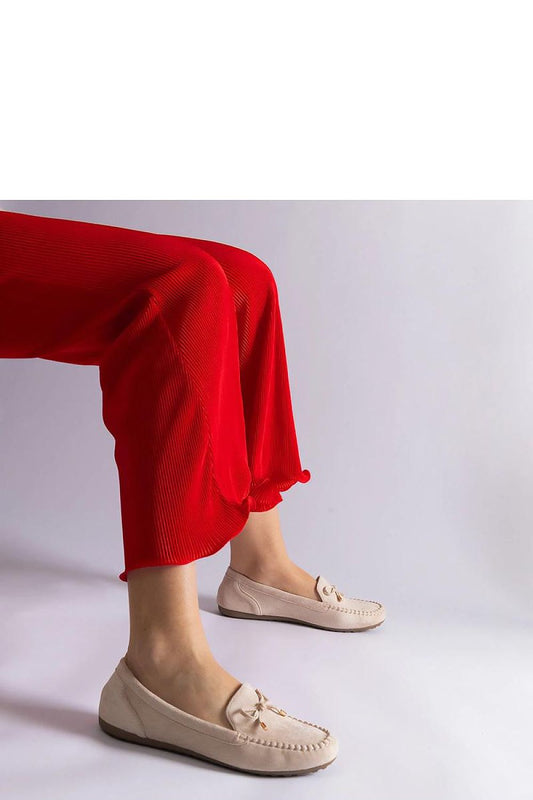 Elegant beige moccasins with a bow by Solea, showcasing a stylish slip-on design perfect for summer. Crafted from high-quality faux suede leather and featuring a comfortable rubber sole, ideal for fashionable women.