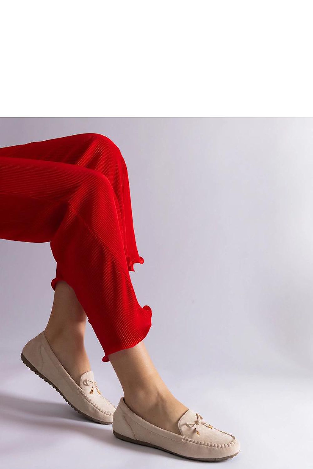 Elegant beige moccasins with bow by Solea, showcasing high-quality faux suede leather, perfect summer slip-ons for stylish women.