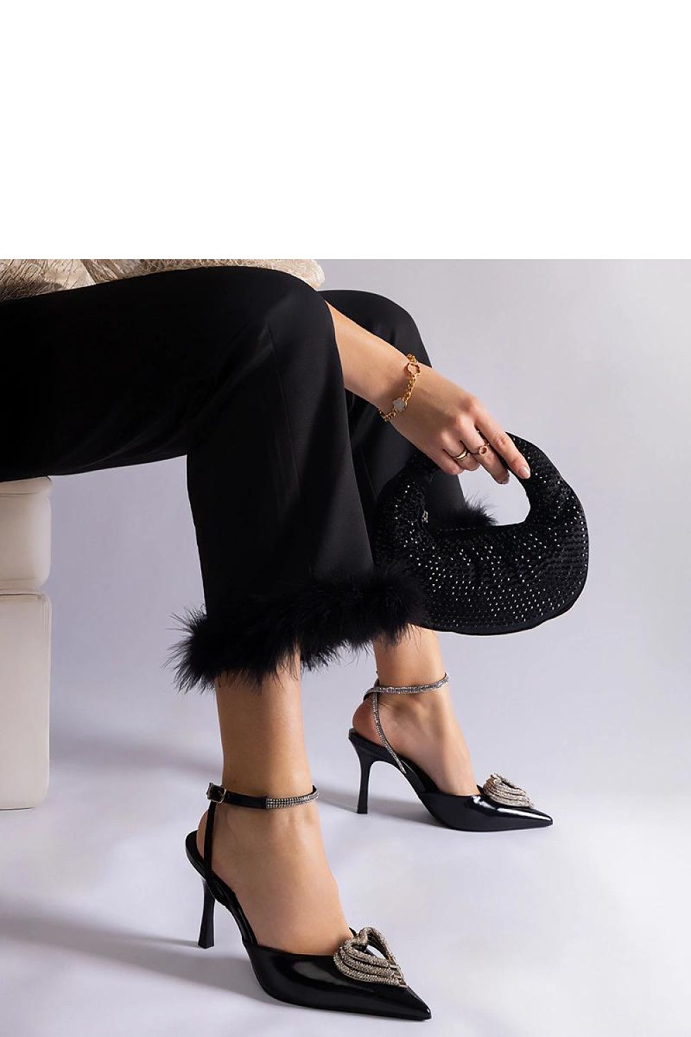 Stylish Solea high heel pumps featuring a sleek design and luxurious zircon embellishments, embodying elegance and comfort.