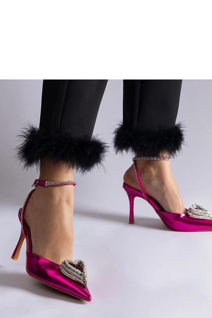 Solea black high heel pumps styled for a summer evening, featuring an open heel and stunning zircon details.