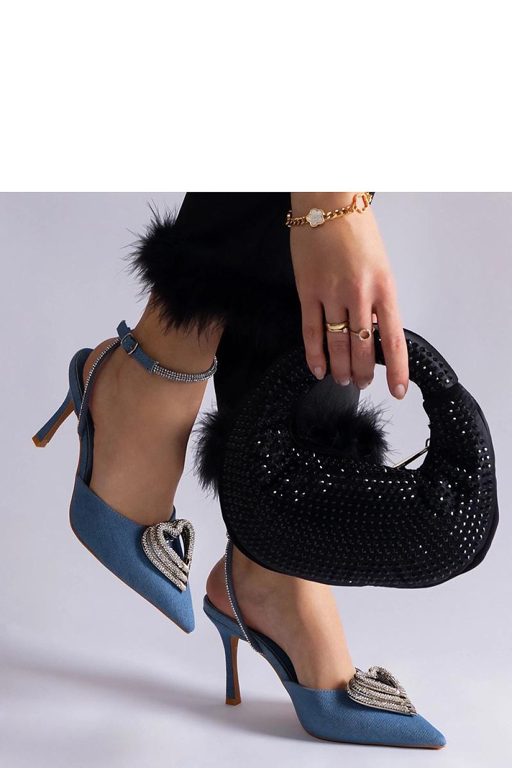 Side view of Solea high heel pumps showcasing stunning zircon accents, designed for the sophisticated woman.