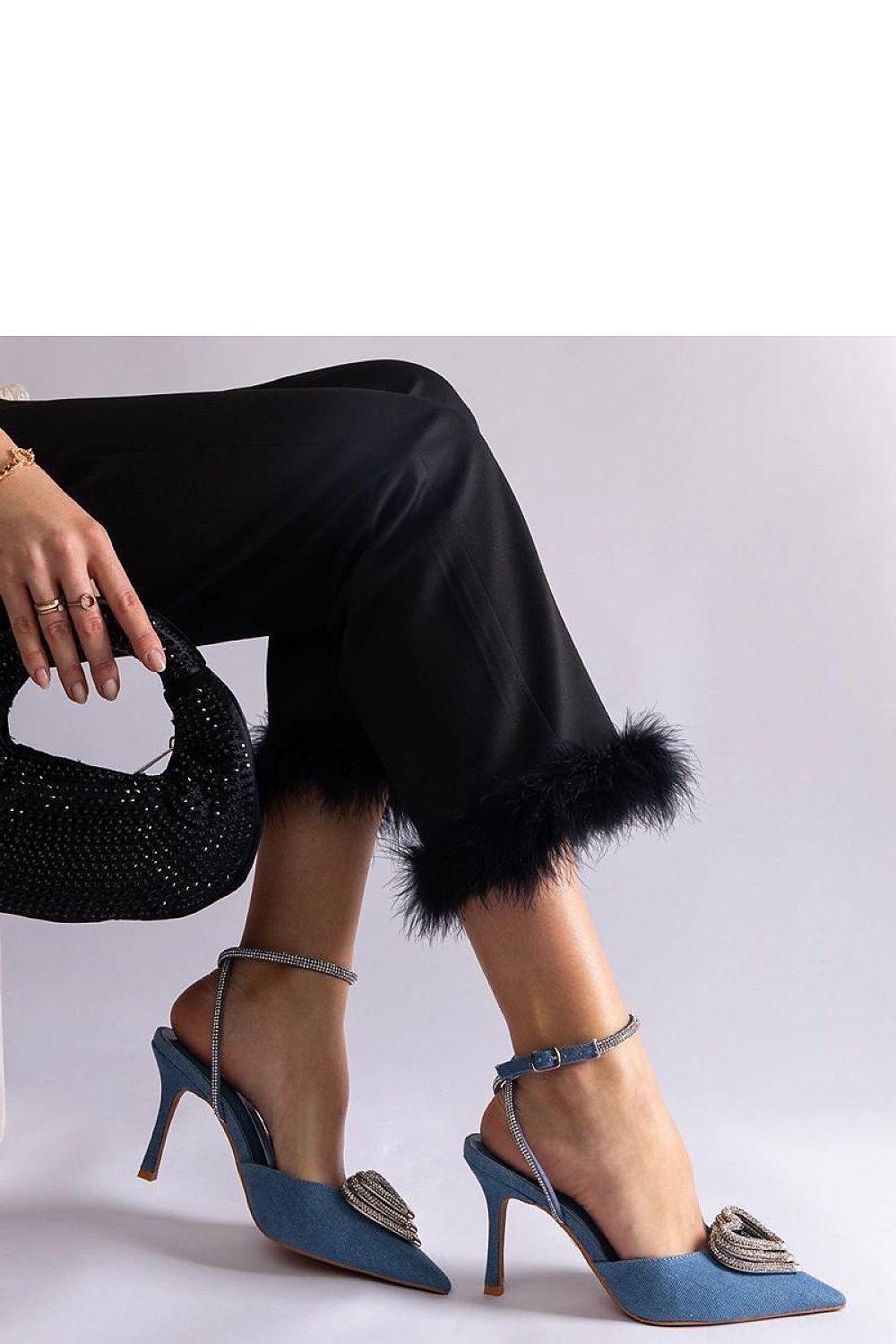 Stylish Solea high heel pumps in black synthetic leather, adorned with charming zircons, exuding luxury and elegance.