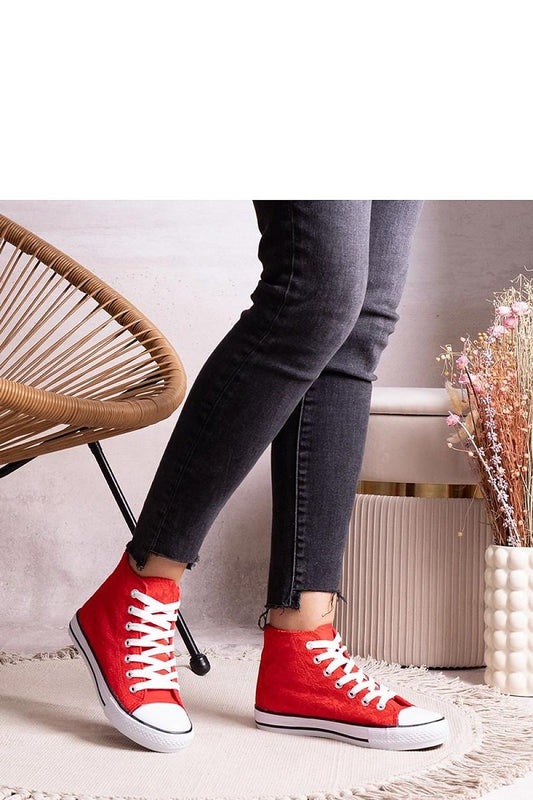 Solea women's red high-top sneakers, showcasing a chic round toe and premium rubber construction for comfort and stability.