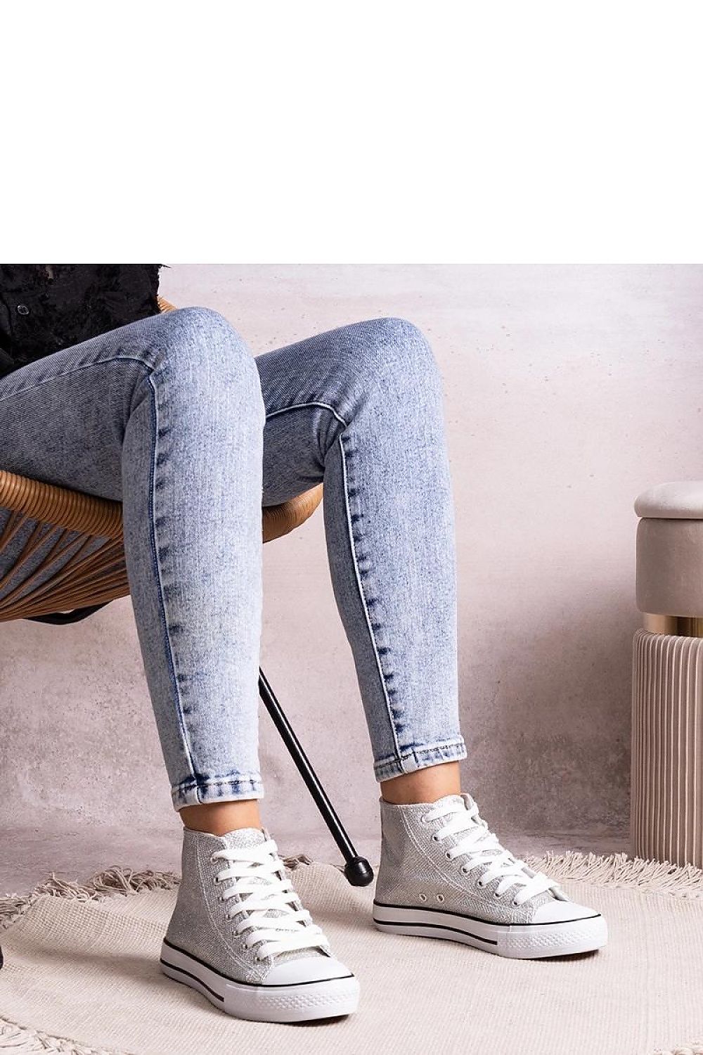 Solea fashion-forward high-top sneakers displayed on a stylish background, embodying modern luxury and trendiness in every detail.