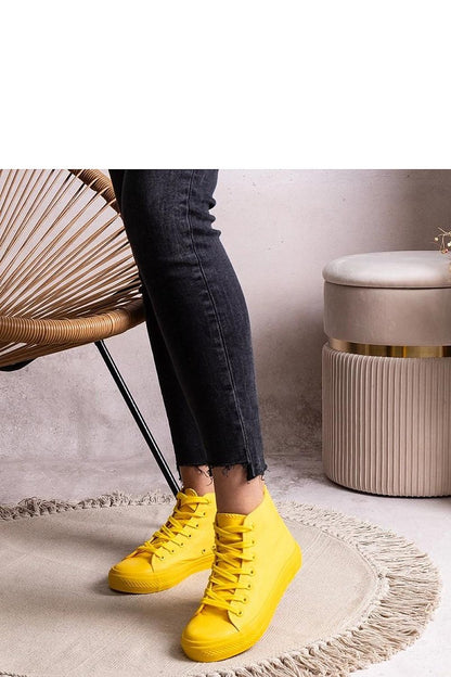 Solea High Denim Sneakers styled with trendy outfits, highlighting the versatility of blue lace-up footwear for every spring and summer occasion.