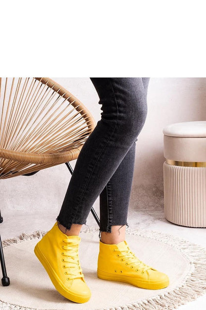 Solea Women's High Denim Sneakers on a fashionable display, emphasizing comfort and stability with a rubber sole and chic design.