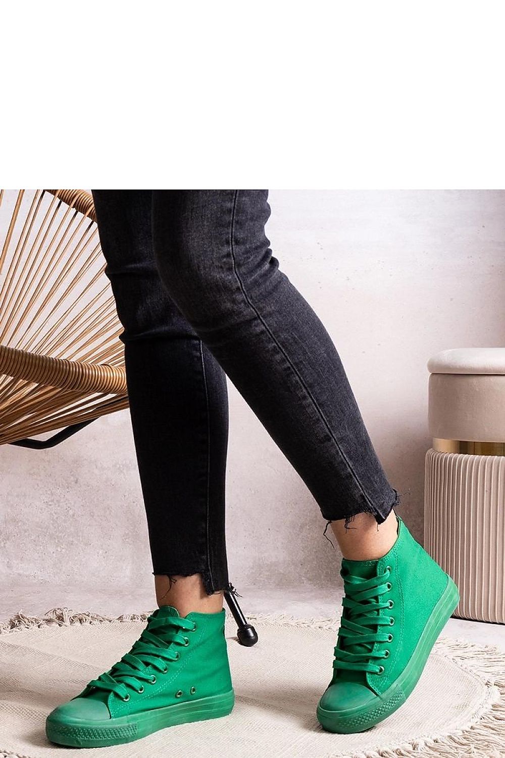 Solea women's high denim sneakers displayed against a chic urban backdrop, accentuating trendy blue colour and modern lace-up feature.