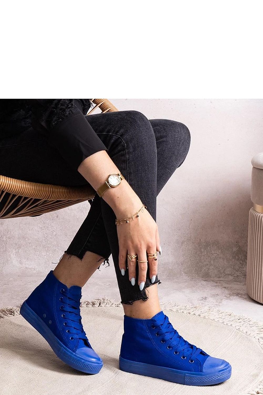 Close-up view of Solea high denim sneakers showcasing the luxurious fabric and lace-up detail, perfect for fashionable women.