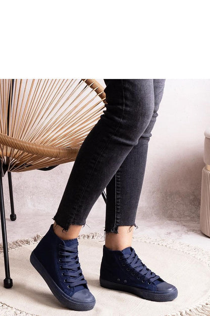 Elegant Solea high denim sneakers displayed against a stylish backdrop, epitomising contemporary women's footwear trend.