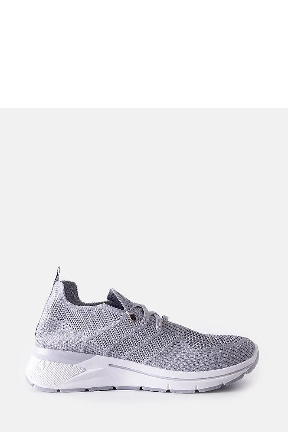 Elegant Solea Grey Slip-On Sneakers for Women, showcasing a sophisticated low-profile design with rounded toe, perfect for summer fashion.