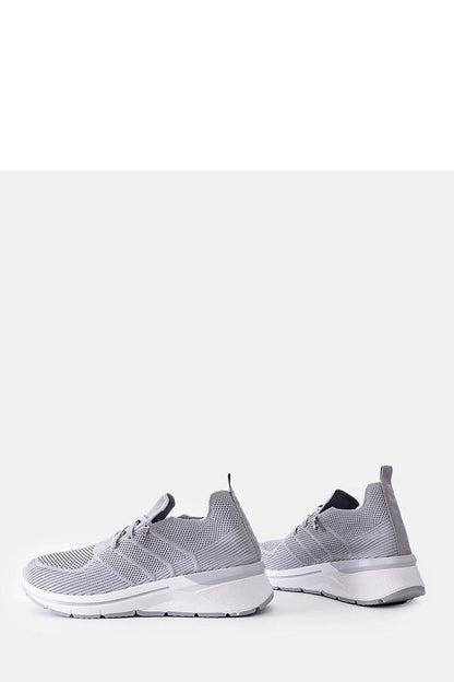 Chic Solea Grey Slip-On Sneakers, featuring a modern slip-on design that reflects luxury and practicality for summer outings.