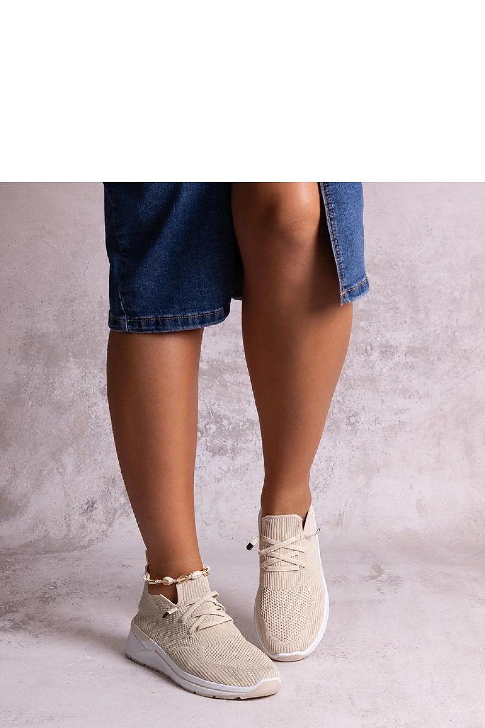 Close-up of Solea grey slip-on sneakers showcasing the premium rubber sole and sleek design, perfect for warm weather.