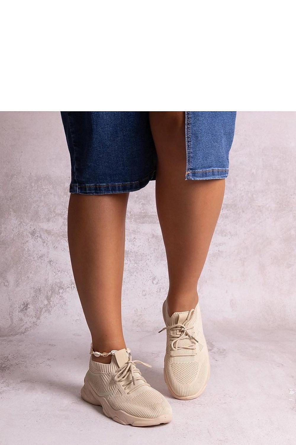 Elegant Solea beige fabric sneakers for women, showcasing comfort and style, perfect for summer days.